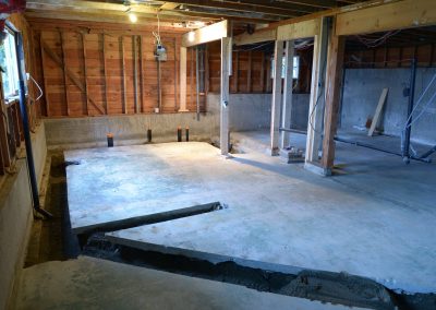 Basement renovation with the slab cut for new plumbing