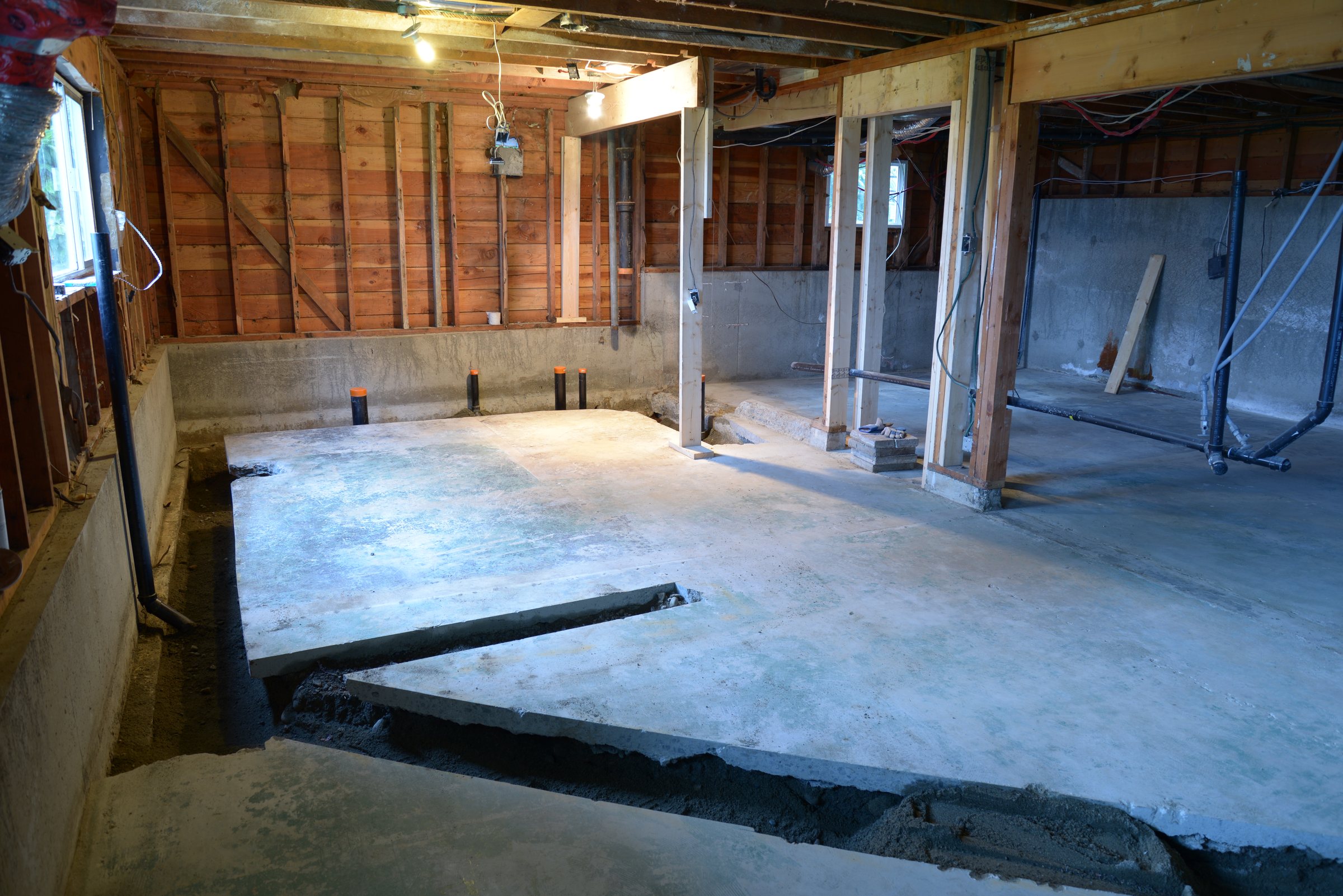 Basement renovation with the slab cut for new plumbing