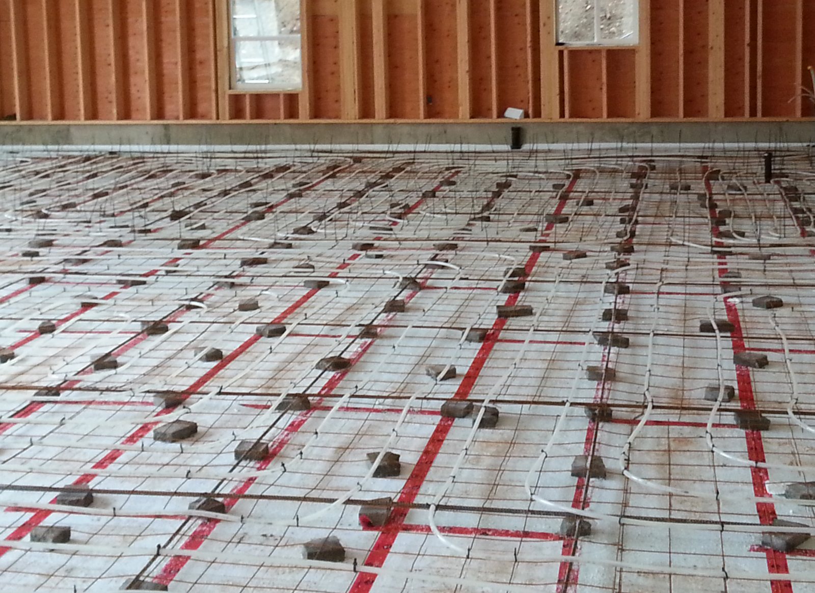 In-floor heating tubing laid before the concrete pour