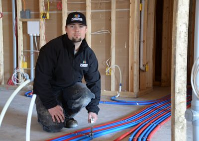 Portside Plumbing & Gas checking a PEX installation