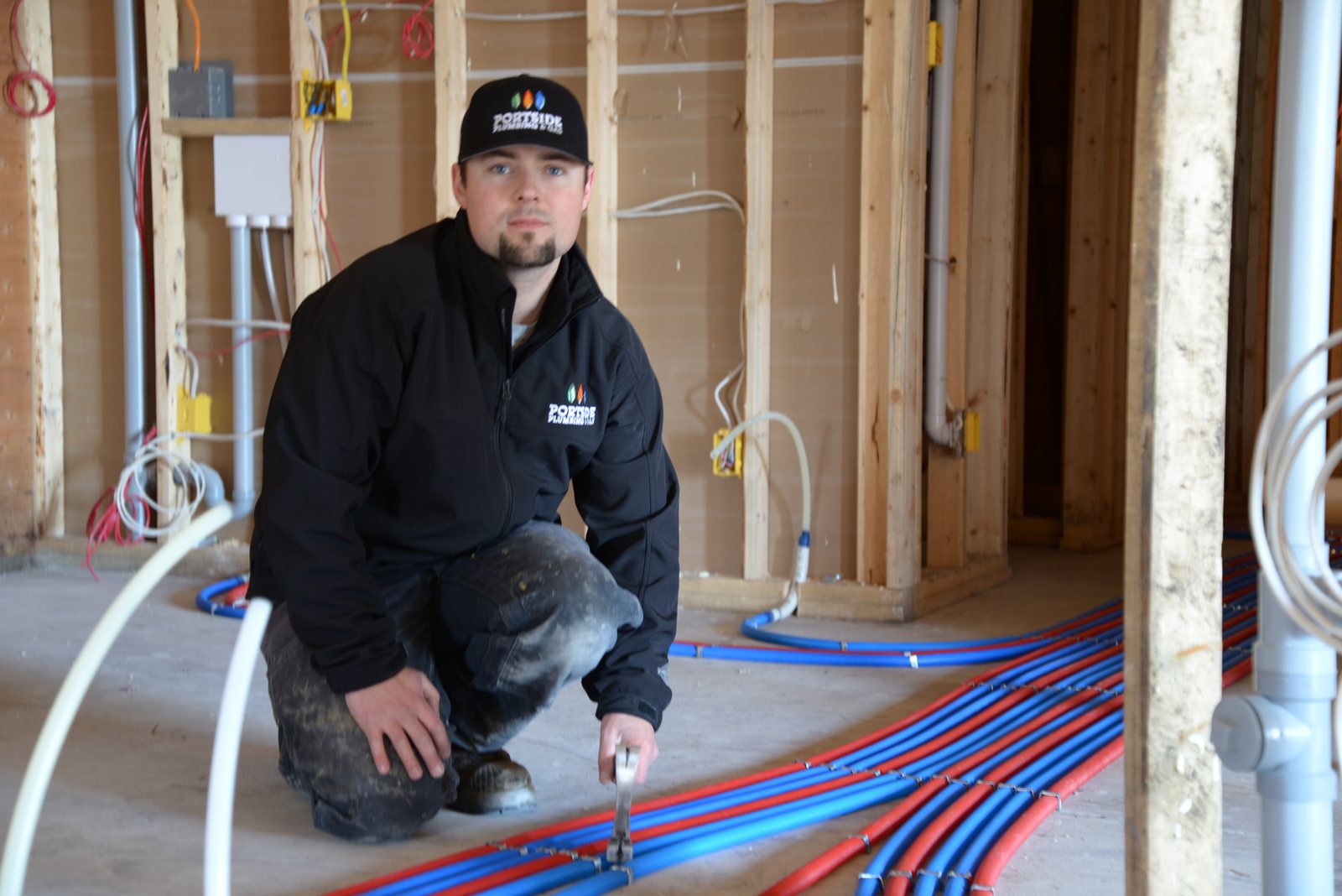 Portside Plumbing & Gas checking a PEX installation